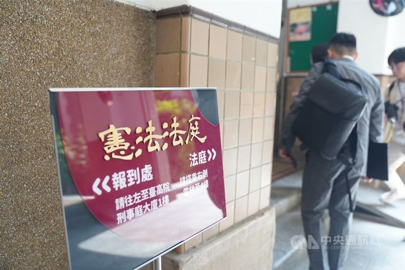 A sign directing people to the constitutional court and its registration. CNA photo April 23, 2024